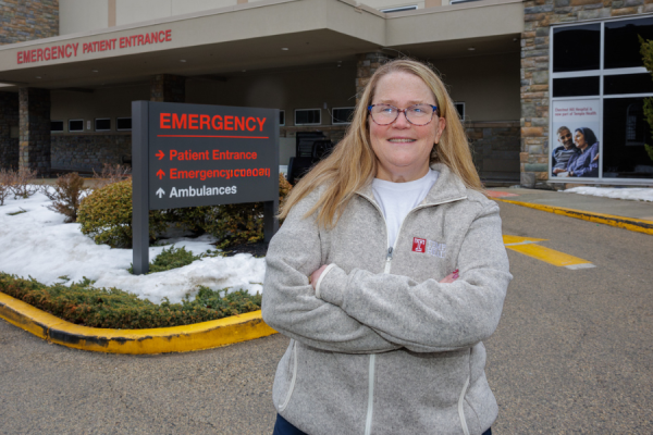 Zimmerman in front of Chestnut Hill Hospital’s Emergency Department entrance.