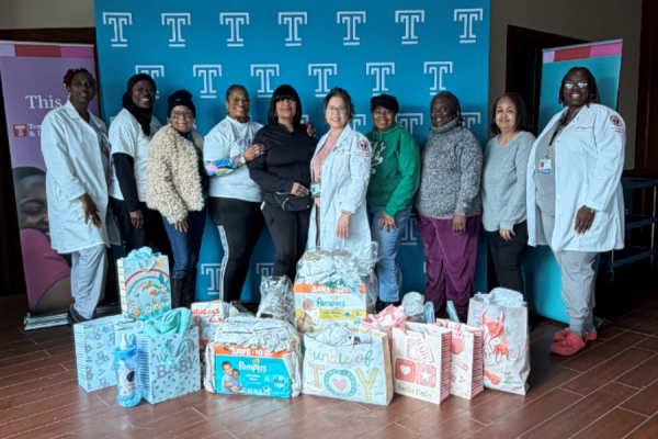 Trinity 79 and Temple Health team members with the former’s donation to the new hospital.
