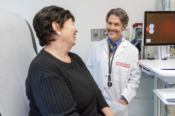 Dr. Salerno works with a patient.