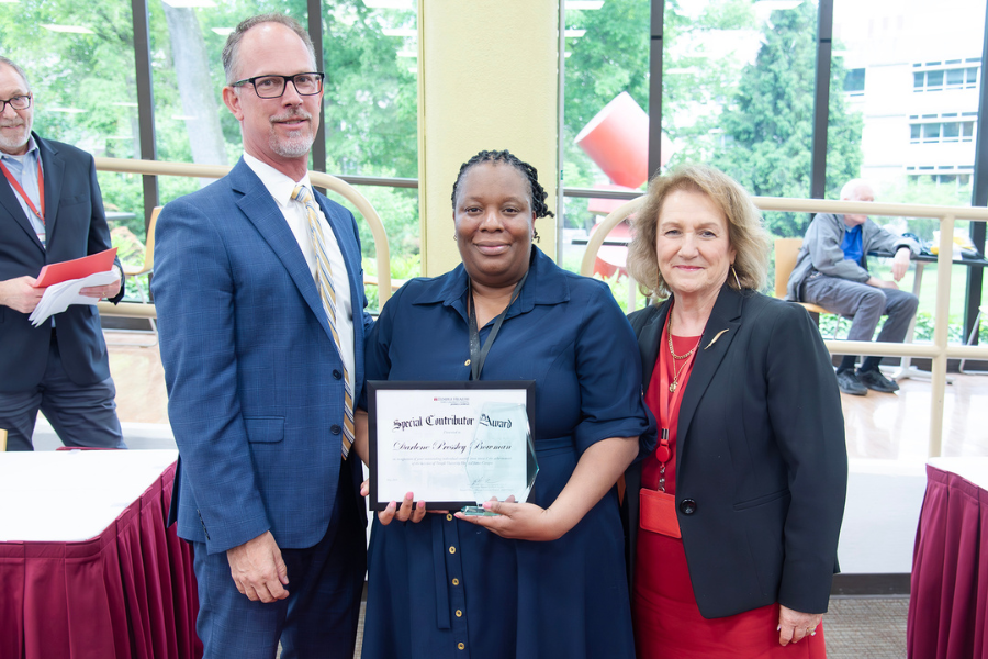 Darlene Pressley Bowman, Supervisor, Patient Access, Admissions Department, TUH – Jeanes Campus (center) with (from left) TUH – Jeanes Campus Executive Director Matthew Shelak, OTR/L, MBA, and presenting speaker Gilda Chinnici.