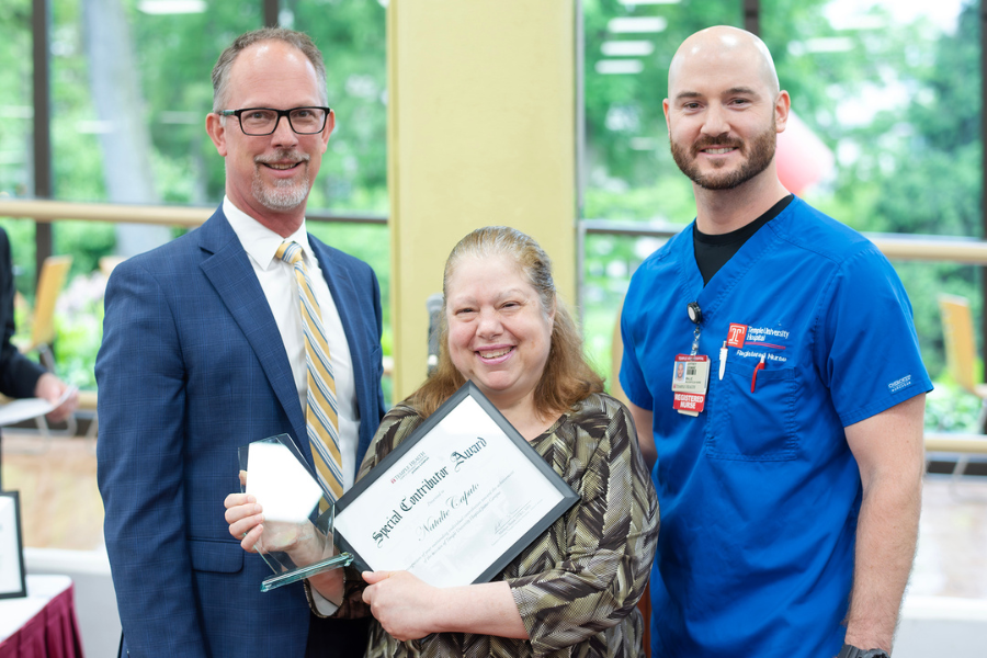 Natalie Rose Caputo, Environmental Assistant, Environmental Services, TUH – Jeanes Campus (center) with (from left) TUH – Jeanes Campus Executive Director Matthew Shelak, OTR/L, MBA, and presenting speaker Jeffrey Grimmie.