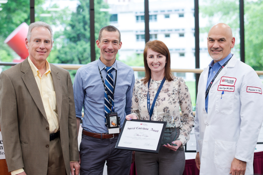 Alison Conn, Practice Administrator, Clinical Genetics, Fox Chase (second from right) with (from left) Jonathan Chernoff, MD, PhD, Cancer Center Director; presenting speaker Michael Hall, MD, MS, FASCO; and Fox Chase President and CEO Robert Uzzo, MD, MBA, FACS.