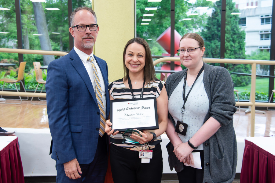 Christine Dolon, Infection Control Practitioner, Infection Control, TUH – Jeanes Campus (center) with (from left) TUH – Jeanes Campus Executive Director Matthew Shelak, OTR/L, MBA, and presenting speaker Pamela Burton.