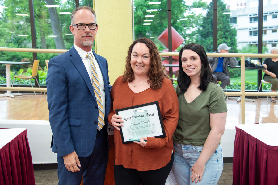 Meghan Durvin, RN-Staff/Clinical Nurse, Bone Marrow Inpatient, TUH – Jeanes Campus (center) with (from left) TUH – Jeanes Campus Executive Director Matthew Shelak, OTR/L, MBA, and presenting speaker Tara Hoffman.