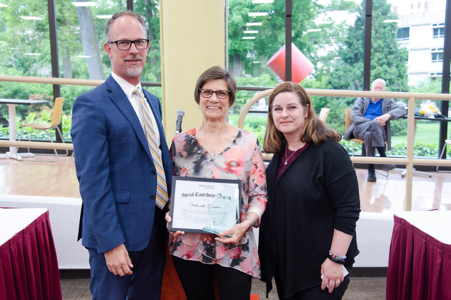 Deborah Gorman, Registered Nurse, Operating Room, TUH – Jeanes Campus (center) with (from left) TUH – Jeanes Campus Executive Director Matthew Shelak, OTR/L, MBA, and presenting speaker Adrienne Reddy.