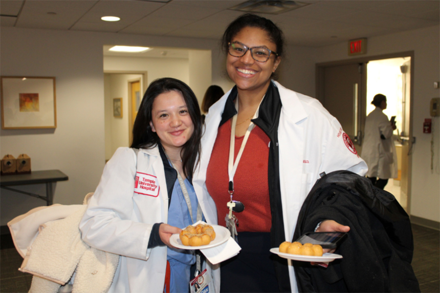 House staff eating mochi donuts