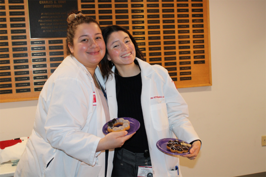 House staff eating mochi donuts
