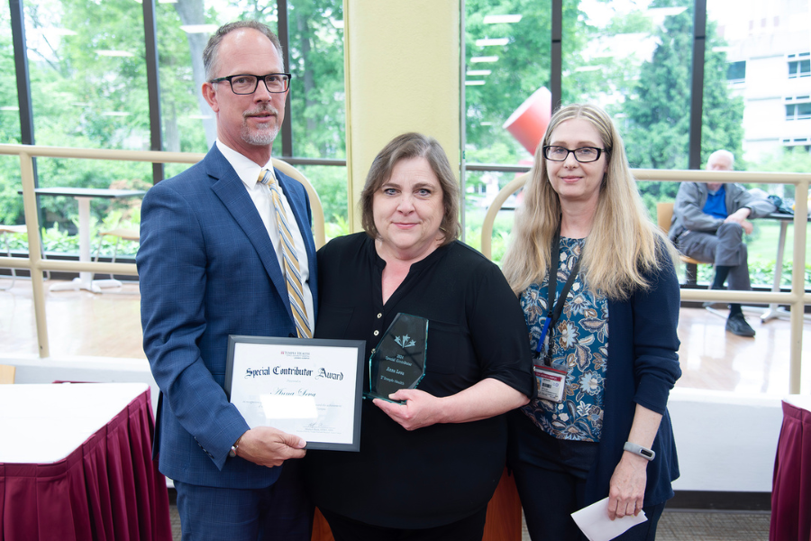 Anna Leva, Coordinator, Rehab Services, Physical Medicine & Rehabilitation, TUH – Jeanes Campus (center) with (from left) TUH – Jeanes Campus Executive Director Matthew Shelak, OTR/L, MBA, and presenting speaker Denise Nawalany.