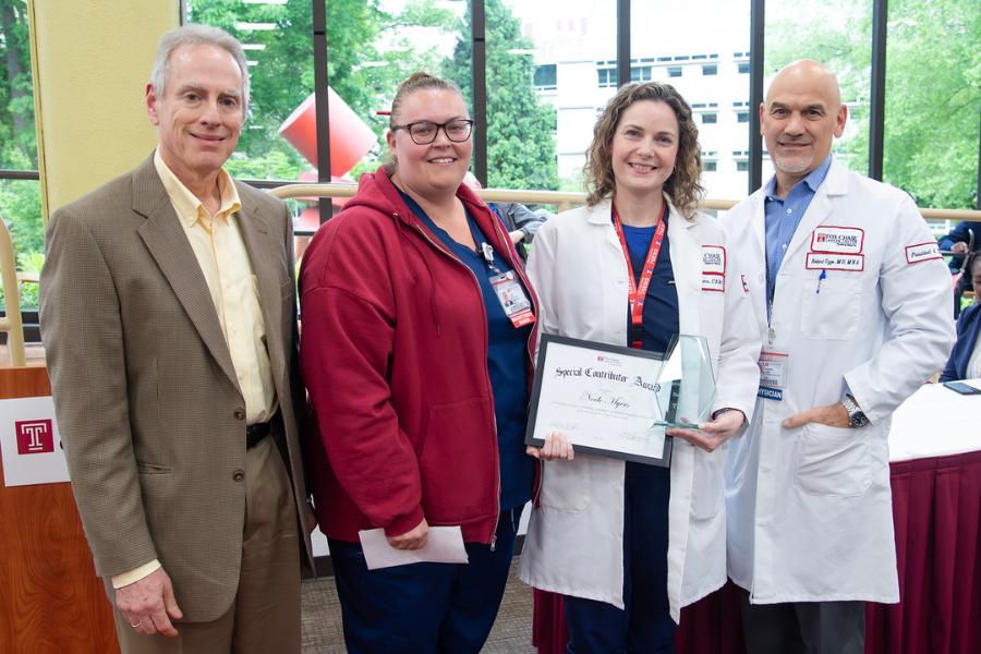 Noele Myers, Nurse Practitioner, Department of Hematology/Oncology, Fox Chase (second from right) with (from left) Jonathan Chernoff, MD, PhD, Cancer Center Director; presenting speaker Lori Stoneck; and Fox Chase President and CEO Robert Uzzo, MD, MBA, FACS.