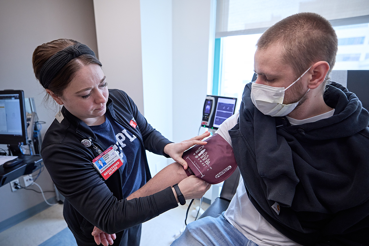 nurse with heart failure patient
