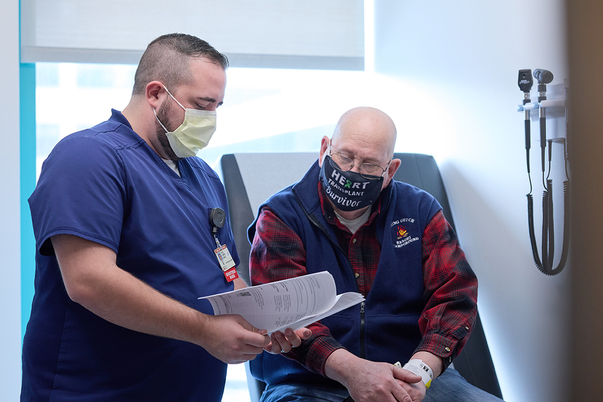 physician with transplant patient