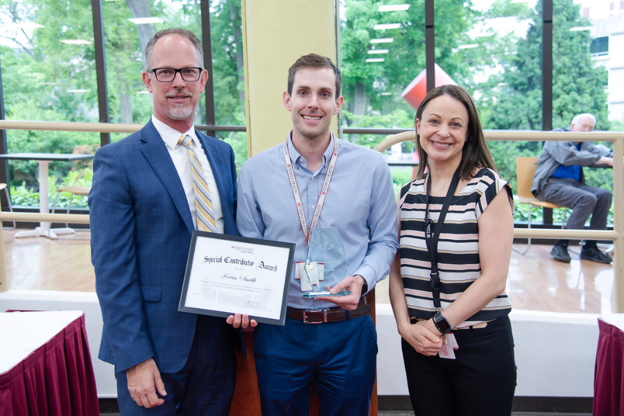 Kevin Smith, Director, Infection Control, TUH – Jeanes Campus (center) with (from left) TUH – Jeanes Campus Executive Director Matthew Shelak, OTR/L, MBA, and presenting speaker Christine Dolon.