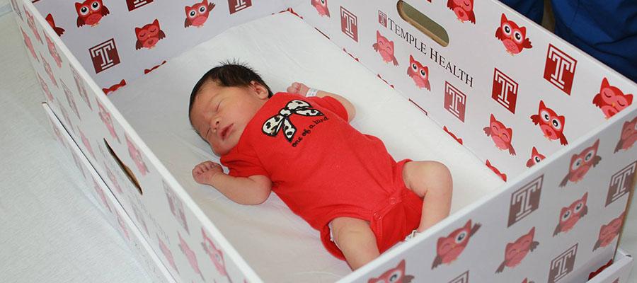 Baby sleeping in Temple Health baby box