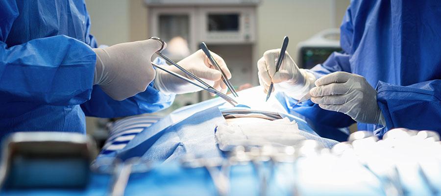 Surgeons performing a heart transplant