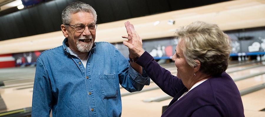 Temple COPD patient, John, bowling with his wife