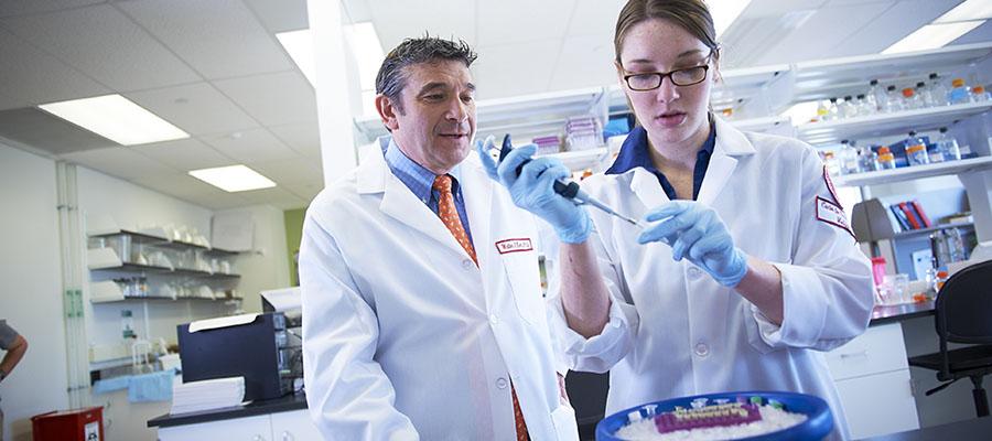 Walter Koch conducting cardiovascular research in a lab
