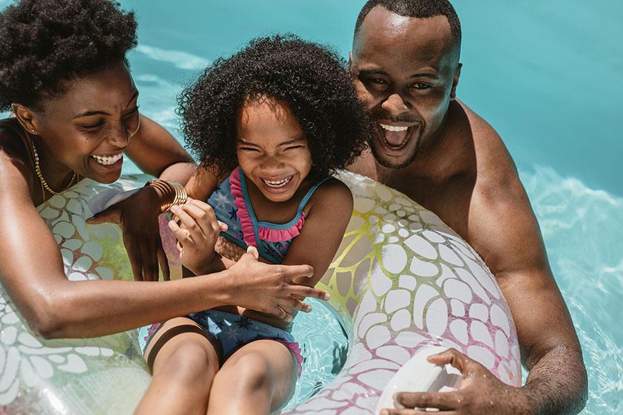 Family enjoying pool together