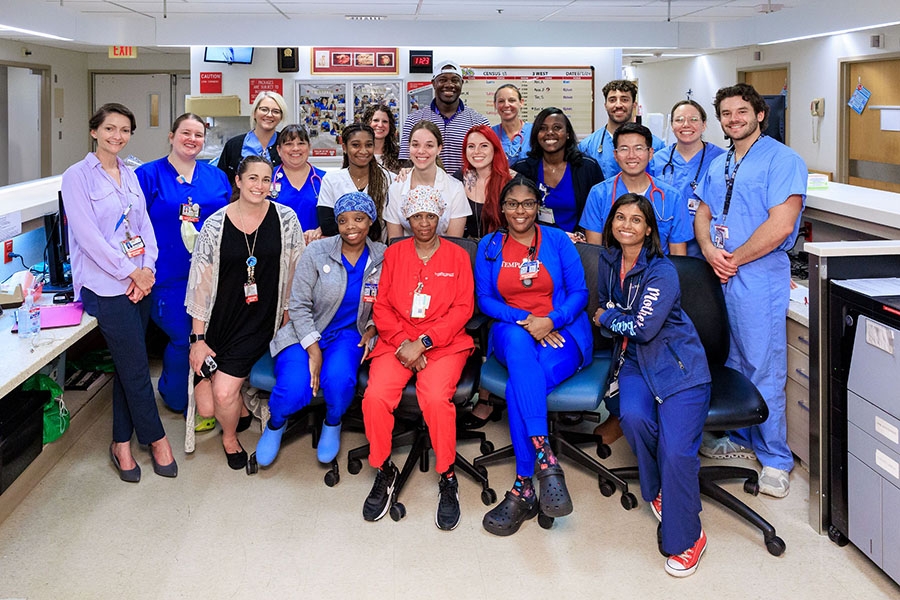 Ryan poses for a photo with our Maternity team.