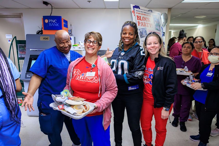 Team members pose together at TUH-Main.