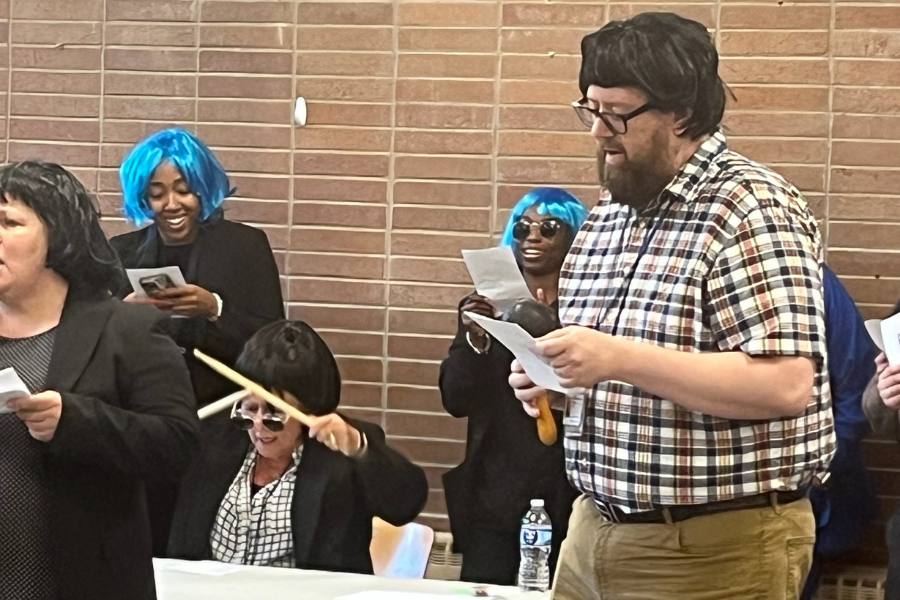 The Malpractice Freaky Finders (top photo, with Valiente in the center) about to perform Beatles karaoke in the cafeteria.