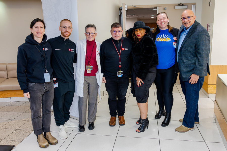 Scott Charles (far right) and The Marjorie Joy Katz Dean of the Lewis Katz School of Medicine Dr. Amy J. Goldberg (third from left) with Melany Nelson, Executive Director of Northwest Victim Services (third from right) and other team members.