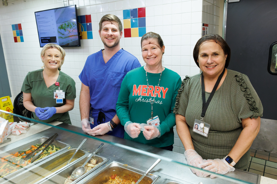 It was all smiles in the TH-CHH kitchen while our volunteers served up the holiday meal!