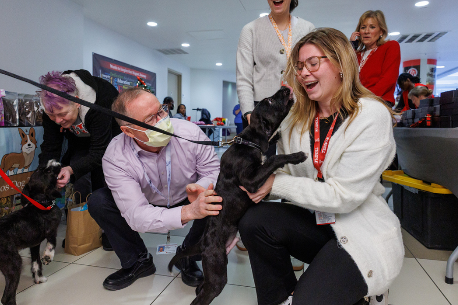 This puppy knew it was a Valentine’s Day event, and came prepared to give kisses!