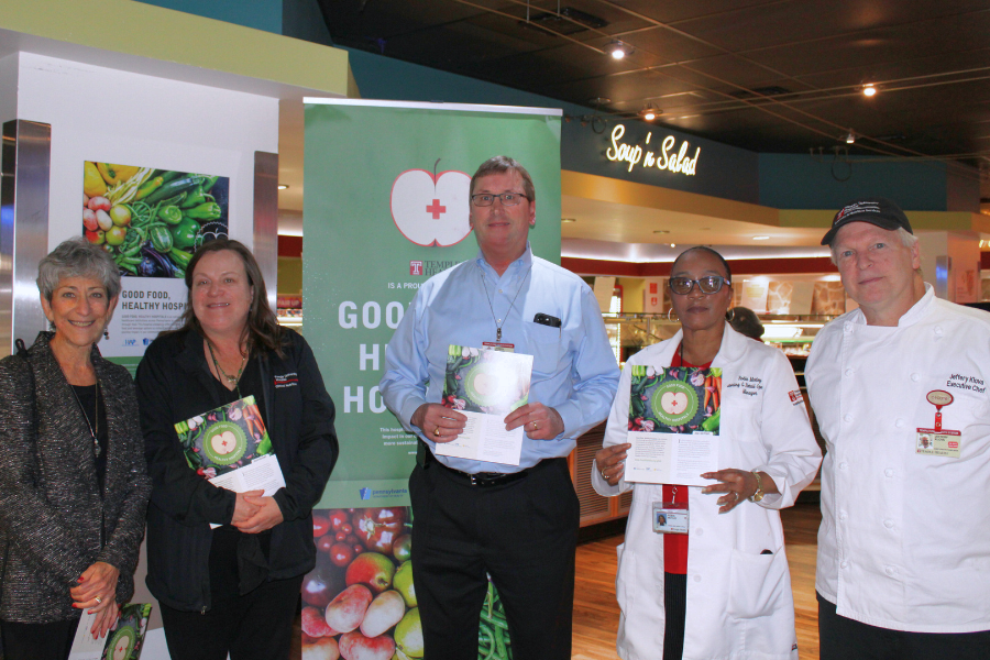 Chamberlain presents the Platinum Status Award to TUH-Main Campus Dietary leaders. 