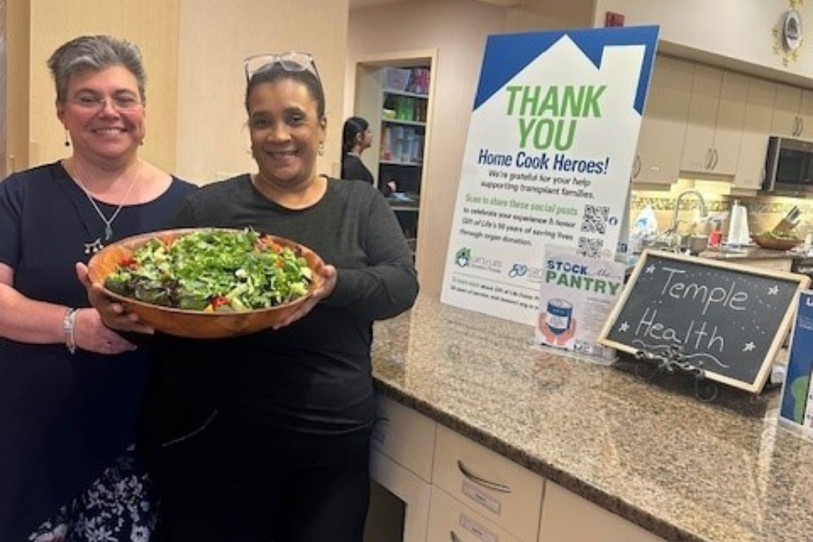 Cristina Ciuciu (left) and Marie Ciceron (right) with the delicious salad they prepared for Howie’s House residents.