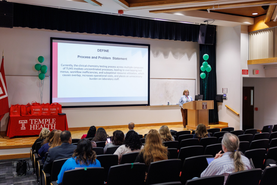 Green Belt graduate Melissa Ulas discusses the DMAIC process during her presentation.