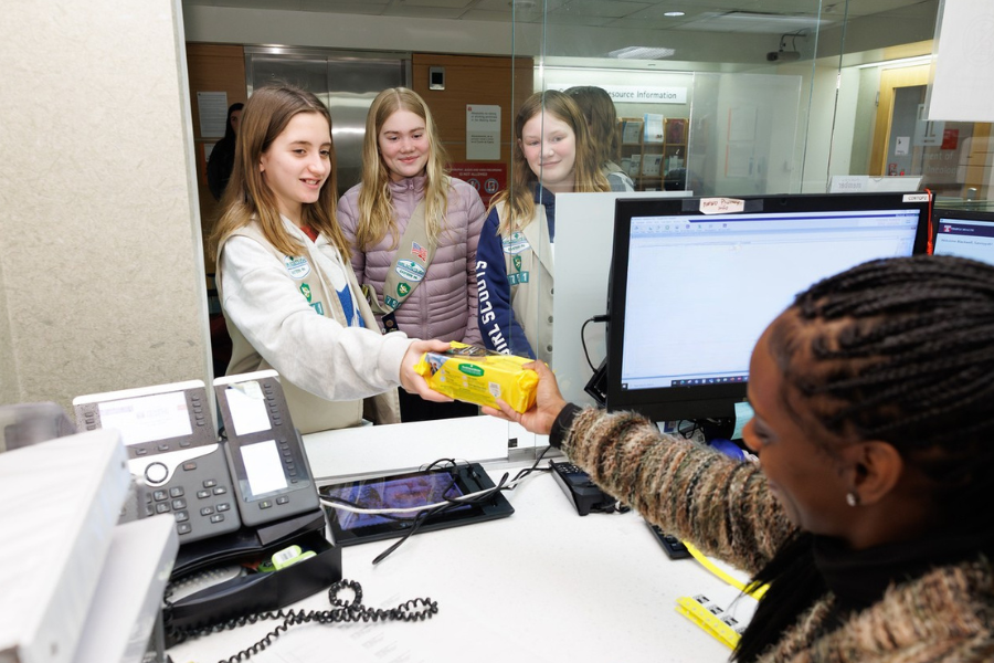 The Girl Scouts handed out their cookies to patients and employees.
