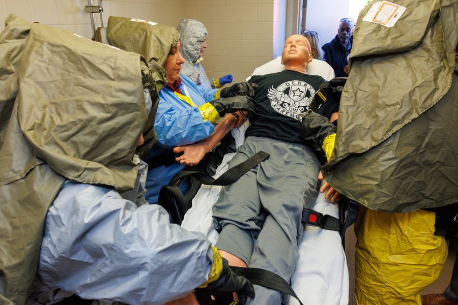 Once the patient reached the decontamination room, Emergency Department participants examined him for radiologic material.
