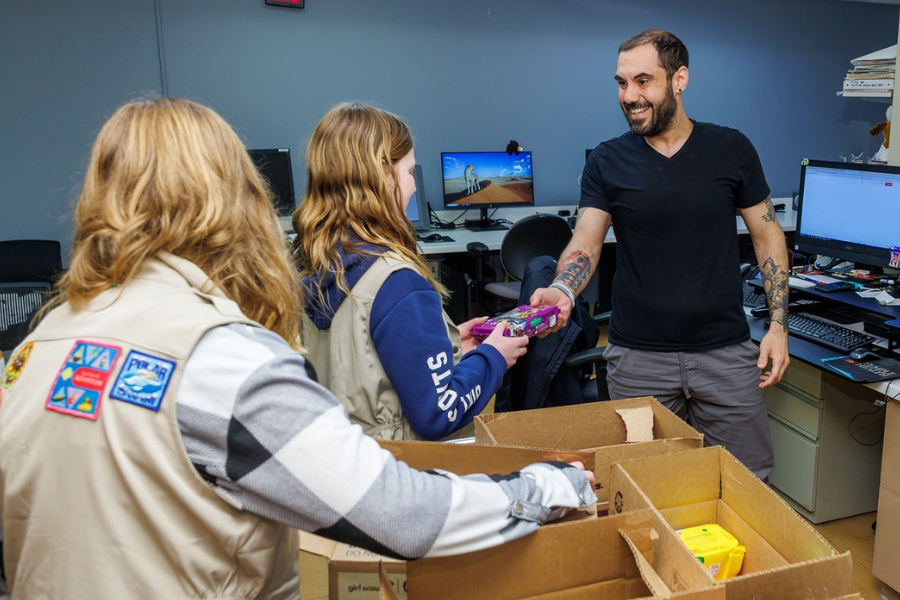 The Girl Scouts handed out their cookies to patients and employees.