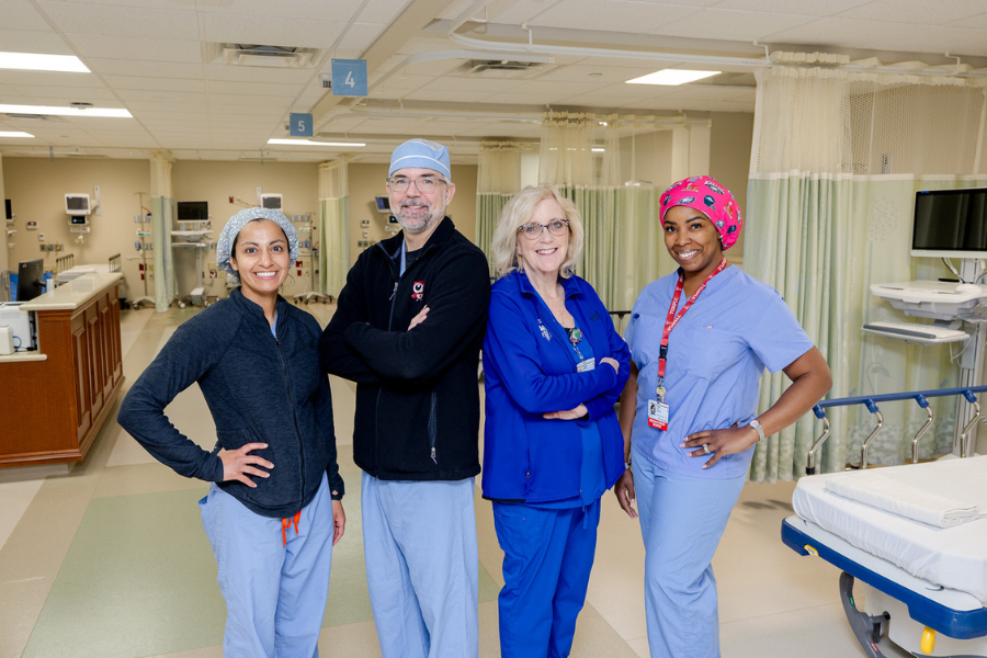 Jasjit Beausang, MD, Assistant Professor of Clinical Obstetrics, Gynecology and Reproductive Sciences at the Lewis Katz School of Medicine; Dr. John Kissko; Peggy White, DNP, NEA-BC, Director of Nursing for the Temple Women & Families ICU; and Ashli Parr, MSN, BSN, RN, CNOR, CSSM, Director of Perioperative Care for Temple Women & Families, who participated in an OR simulation at the new hospital. 