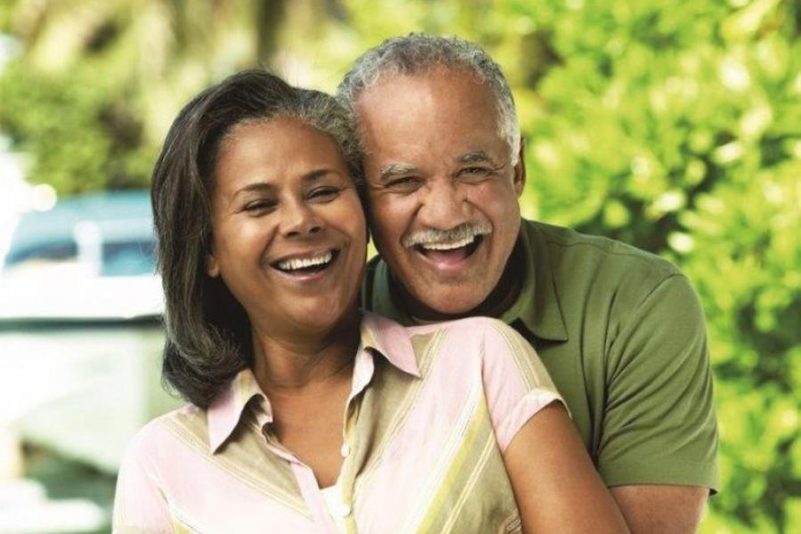 Couple hugging outside