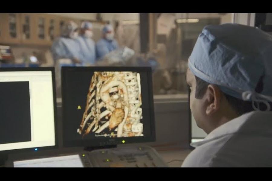 Interventional cardiologist looking at x ray