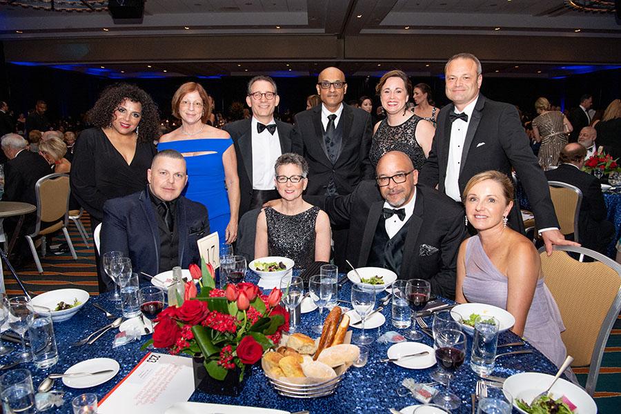 2019 Acres of Diamonds Gala Night attendees around table