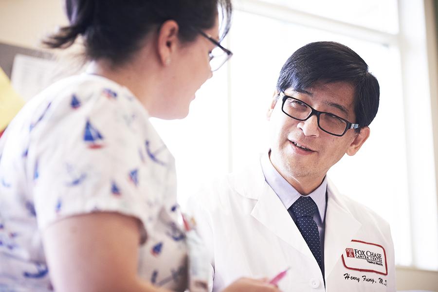 doctor discusses clinical trial