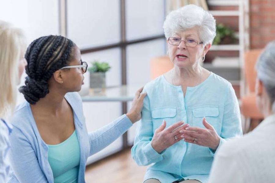 Patients talking at support group