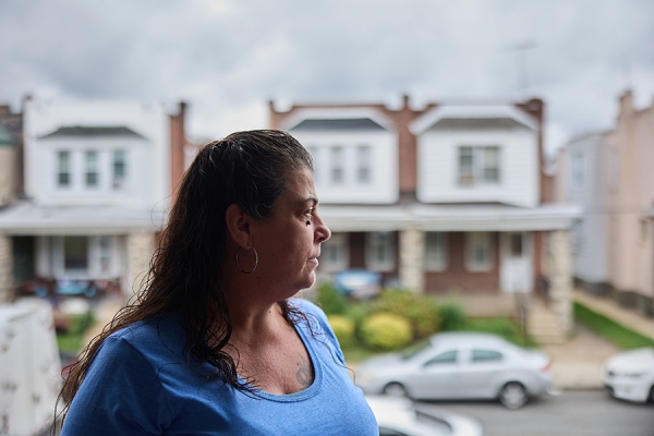 Marie looking off her porch