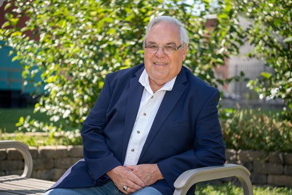 Pulmonary embolism patient, Ted sitting on a bench