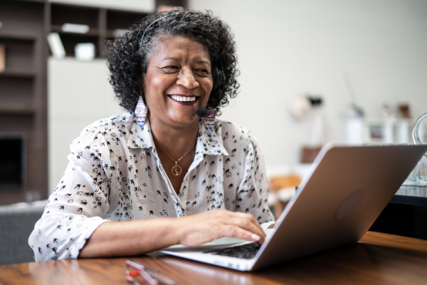 Older woman working on laptop