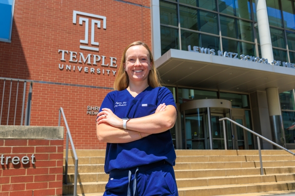 Dr. Nygren in front of the Lewis Katz School of Medicine at Temple University.