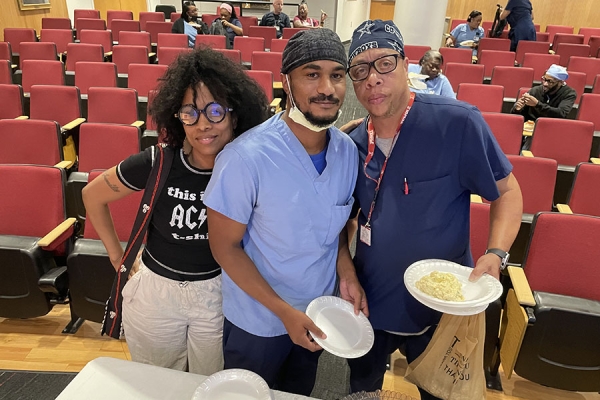 Main Campus team members enjoy a catered breakfast at Friday's EVS Week celebration.