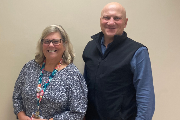 Tsypenyuk (right) and his colleague Alexis Puglia (left). Not pictured: Pam Laurent, another member of the Performance Excellence team.