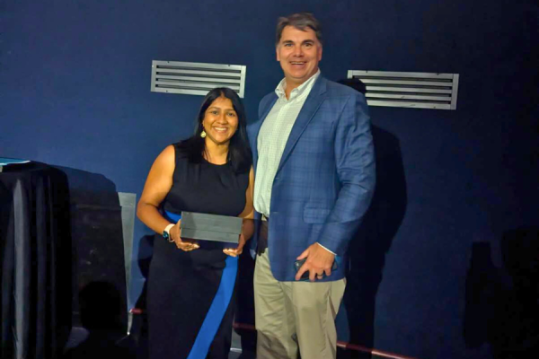 Dr. Shah Pandya receives her John M. Daly, MD Service Award.