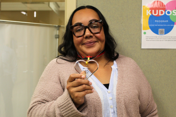 Receptionist/Scheduler Josephine Balderas with her TFP C.A.R.E.S. Award.