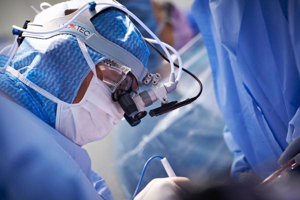 Closeup of Robert Boova performing surgery