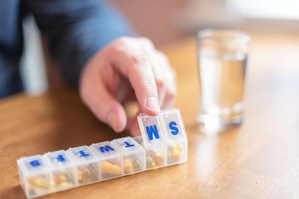 Closeup of blood pressure pills in pill organizer