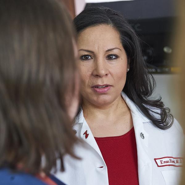 Dr. Eman Hamad talks with heart failure patient